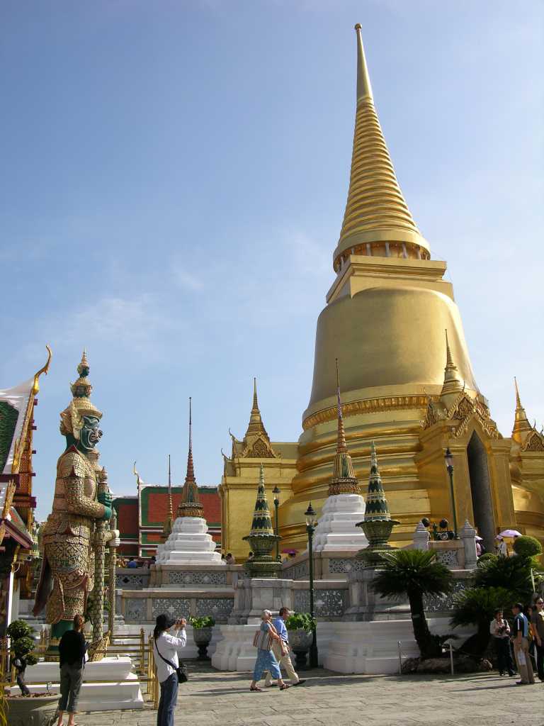 Bangkok 04 02 Wat Phra Kaeo Golden Phra Siratana Chedi Just after entering the Wat Phra Kaeo we saw the golden Phra Siratana Chedi, a 19th-century Sri Lankan-style stupa supposedly housing ashes of the Buddha.